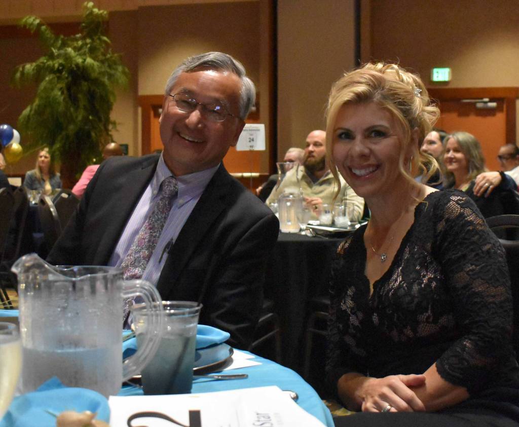 Grays Harbor County Administrator Sam Kim and County Commissioner Georgia Miller pose for a photo at the GGHI Leaders Banquet at the Quinault Beach Resort and Casino in Ocean Shores.