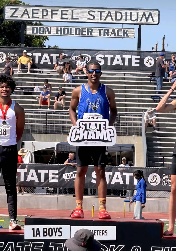 SUBMITTED PHOTO Elma sophomore Ricardo Guadarrama stands atop the podium after winning the 1A State Championship in the boys 200 meters on Saturday in Yakima.