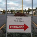 Genna Martin / Crosscut
The entrance to Leisure Manor Estates in Aberdeen, a 55+ mobile home community purchased by Hurst & Son in late 2021. Mobile home parks are one of the last reliable affordable-housing options in the state, especially for people on fixed incomes.