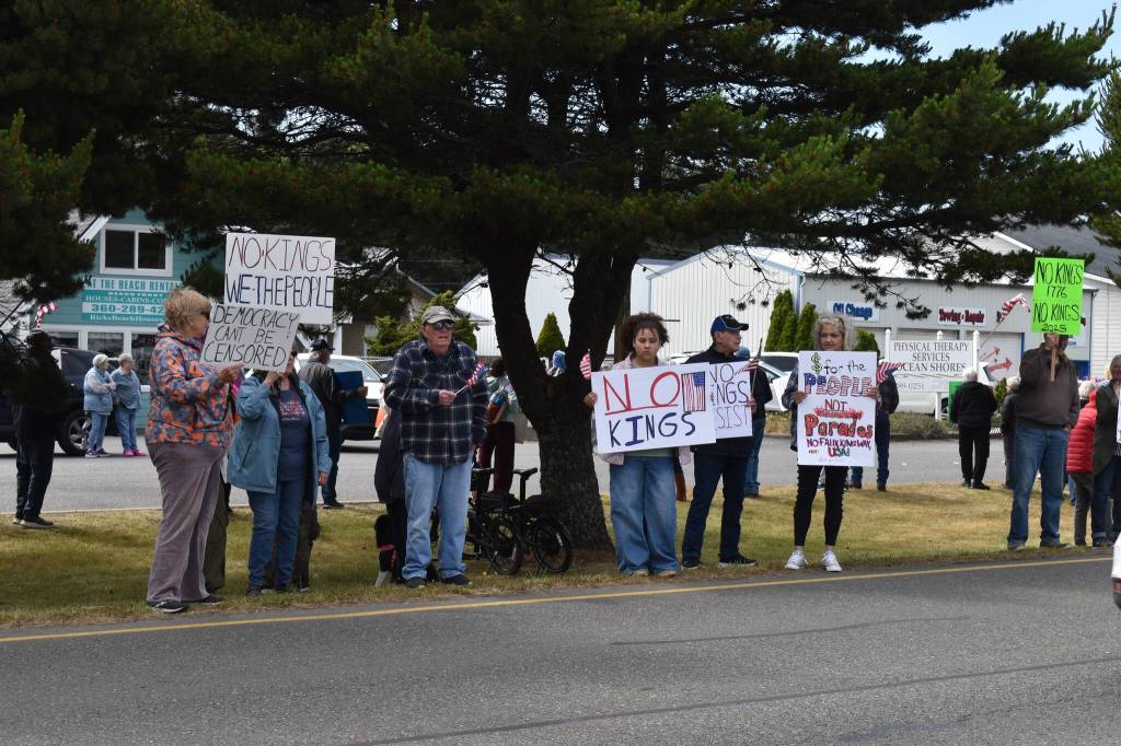 Protestors lined both sides of the street and the median on Point Brown Avenue in Ocean Shores.