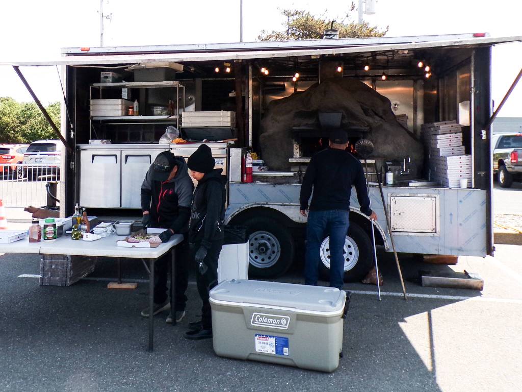 A food trailer serves up some pizza.