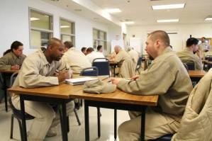 Department of Corrections
Students meet in small groups to discuss educational material at Stafford Creek Corrections Center.