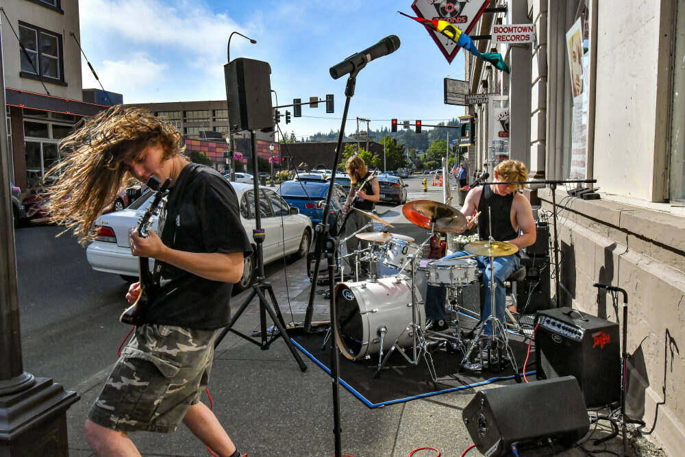 The essence of the festival: Grungers rocking the street in Aberdeen at last years event. (Darrell Westmoreland)