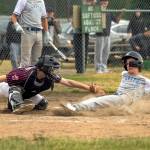 PHOTO BY FOREST WORGUM Montesano catcher Levi Glowacki (left) tags out a Capitol runner for the final out of a 14-8 win in the District 3 Junior Little League Tournament on Sunday in Olympia.