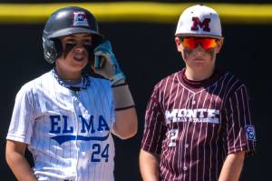 PHOTO BY FOREST WORGUM Elmas Wyatt Coon (24) and Montesanos Tyson Jones focus in during a Little League District 3 Major Tournament game on Sunday in Montesano.