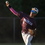 PHOTO BY FOREST WORGUM
Montesano's Charles Shell throws out a runner at home during a 14-0 loss to East Jefferson in a Little League Junior Division State Tournament game on Sunday in Port Orchard.