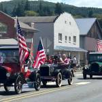 Antique cars highlight the Oakville Independence Day Parade.