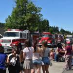 Jerry Knaak photos / The Daily World
McCleary fire vehicles roll down Simpson Avenue at the start of the McCleary Bear Festivals Grand Parade on Saturday.