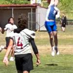 Elma senior Isaac McGaffey goes up to deflect a pass from Hoquiam quarterback K.J. McCoy at the Grays Harbor Football Camp.
