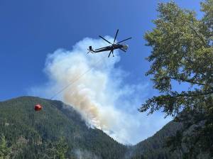InciWeb photos
Skycrane returns for a bucket refill on Lake Cushman Thursday