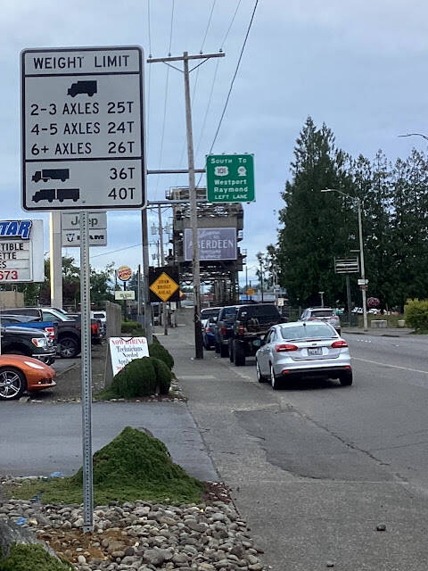 When certain vehicles are restricted from using a bridge, signs are placed approaching the bridge notifying travelers. These signs were placed on US 12 near the Wishkah River Bridge after the bridge was weight restricted in June 2025. The signs were covered on July 22, after repairs were completed.