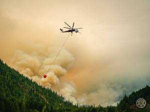 Olympic National Forest
A helicopter conducts bucket drops over the Bear Gulch Fire.
