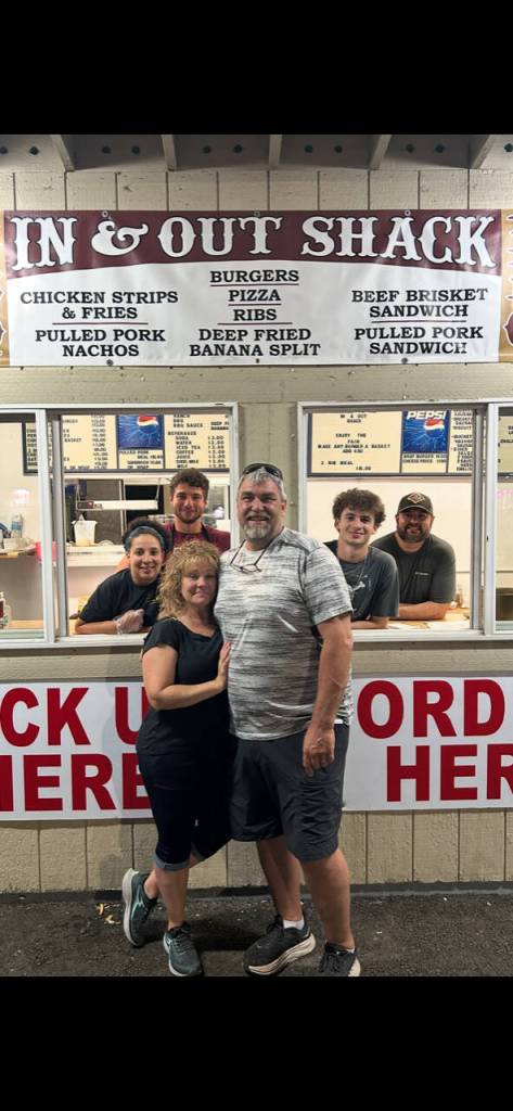 Debbie and Adam Erickson and crew from In & Out Shack BBQ late Saturday.