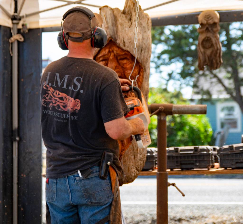 Jeffrey Michael performs chainsaw carving live at Tokeland Woodfest.