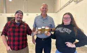 Port of Grays Harbor
Port of Grays Harbor Executive Director Leonard Barnes celebrates Steam Donkeys new lease that will double production capacity with owners Jonathan and Stefanie Bennett.