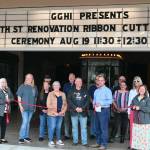 Greater Grays Harbor, Inc. supporters gather in front of the 7th Street Theatre on Tuesday.