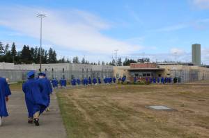Grays Harbor College photos
Stafford Creek Corrections Center inmates walk to receive their various degrees from Grays Harbor College.