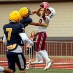 PHOTO BY FOREST WORGUM Hoquiam receiver Javonni Koth (10) makes a leaping catch against Forks during the Montesano Jamboree on Friday at Jack Rottle Field in Montesano.
