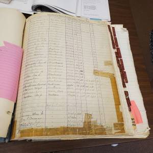 Andrea Watts photos / The Daily World
To make searching the Wynooche Cemetery records easier, Deputy Clerk Chey Smith transcribed the records listed in the well-used cemetery book into an Excel file. Later, these records were migrated into an online database.