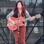 The Daily World photos
Jillian Mixon performs her rendition of Neil Youngs Harvest Moon outside at the Ocean Shores Art Festival Saturday.
