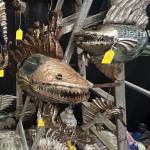 Intricate glass and metal art pieces from a vendor at the Ocean Shores Art Festival.