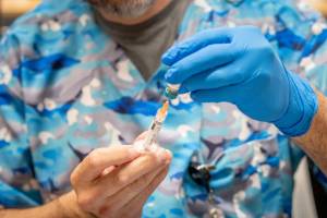 Photo by Jan Sonnenmair / Getty Images
Raynard Covarrubio fills a syringe with the MMR vaccine, at a vaccine clinic put on by Lubbock Public Health Department on March 1, in Lubbock, Texas.