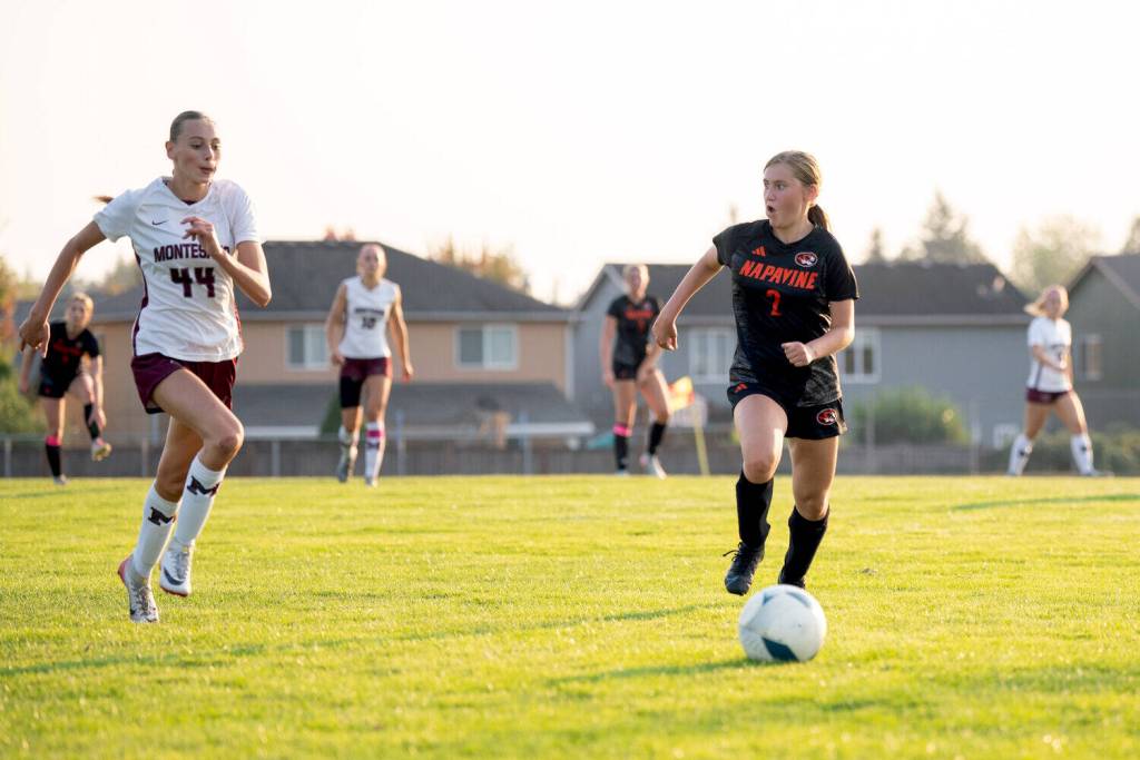 OTTO RABE | THE CHRONICLE Montesanos Haley Schweppe (44) chases down the ball against Napavines Emily Mendoza during the Bulldogs 4-1 win on Thursday in Napavine.