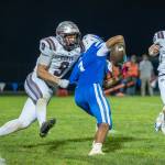 PHOTO BY FOREST WORGUM Montesanos Isac Hawkins (9) makes a tackle during a 20-19 win over La Center on Friday in La Center.