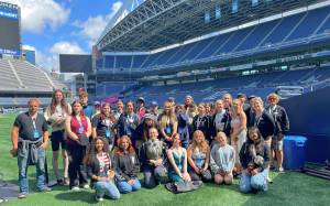 Grays Harbor College
TRIO Upward Bound students, staff, and chaperones at the entrance of the Tunnel Club, where Seattle Seahawks players enter the field.