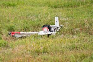 Otto Rabe / The Chronicle
An unidentified aircraft rests in a field on the north side of state Route 6 after its pilot crashed in Chehalis on Thursday, Sept. 11, 2025.