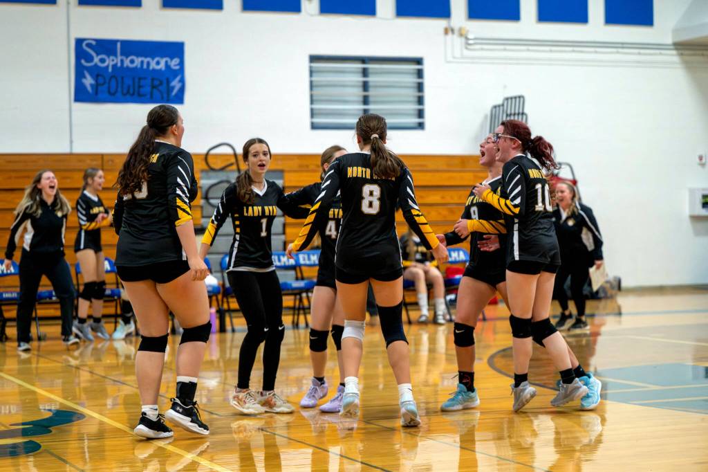 PHOTO BY FOREST WORGUM The North Beach Hyaks celebrate a 3-2 win over Elma on Thursday at Elma High School.