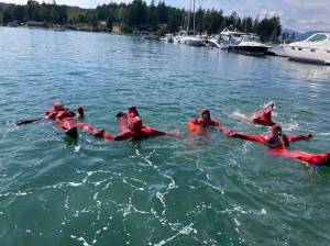 Washington Sea Grant photos
Participants of the Drill Instructor and Fishermen First Aid and Safety Training will get hands-on experience practicing life saving skills, such as putting on survival suits.