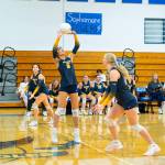 NICOLE SHANNON | MAIN FOCUS MEDIA Aberdeens Mia Hallak (6) sets the ball while hitters Micah Turpin (2) and Dallyn Williams prepare to hit during a straight-set victory over Elma on Wednesday at Elma High School.