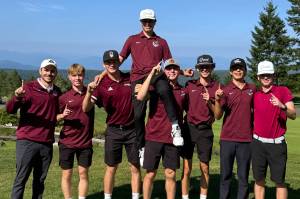 SUBMITTED PHOTO The Montesano Bulldogs (from left) Head Coach Tyler Grajek, Rufus Krasowski, Caden Grubb, Niall Kohlmeier, Colton Grubb, London Towle, Aaron Black and Ayhdn Sauer won the Sibley Scramble with an event-record score of 130 on Monday in Union.