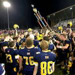 RYAN SPARKS | THE DAILY WORLD The Aberdeen Bobcats celebrate after defeating Hoquiam 43-7 in the 120th Myrtle Street Rivalry on Friday at Olympic Stadium in Hoquiam.