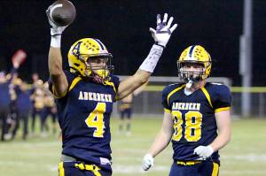 RYAN SPARKS | THE DAILY WORLD Aberdeens Adonis Hammonds (4) celebrates with teammate Ryder Creamer during a 43-7 win over Hoquiam in the 120th Myrtle Street Rivalry on Friday at Olympic Stadium in Hoquiam.