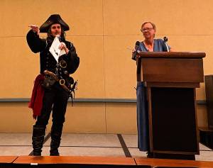 Kyndra Burkland photos
A pirate auctioneer and North Beach PAWS Nanette Sparrow.