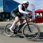 SUBMITTED PHOTO Team Motley Tu Tus Bill Wallace competes in the road bike portion of the Big Hurt Multi-Sport Race on Saturday in Port Angeles. The Harbor-based team placed second overall for the second year in a row.