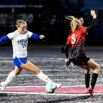 PHOTO BY MIKE ROBERTS Elma senior Chloe Donais (left) dribbles the ball during a 7-0 loss to Tenino on Tuesday in Tenino.