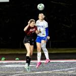 PHOTO BY MIKE ROBERTS Elma junior midfielder Makenna Monroe (right) gets her head on the ball during a 7-0 loss to Tenino on Tuesday in Tenino.