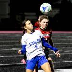 PHOTO BY MIKE ROBERTS Elma midfielder Zippy Valentine (3) competes for possession during a 7-0 loss to Tenino on Tuesday in Tenino.