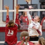 PHOTO BY FOREST WORGUM Montesano middle blocker Violet Prince (right) attempts a spike against Hoquiams Piper Stankavich (13) during the Bulldogs 3-0 win on Tuesday in Hoquiam.