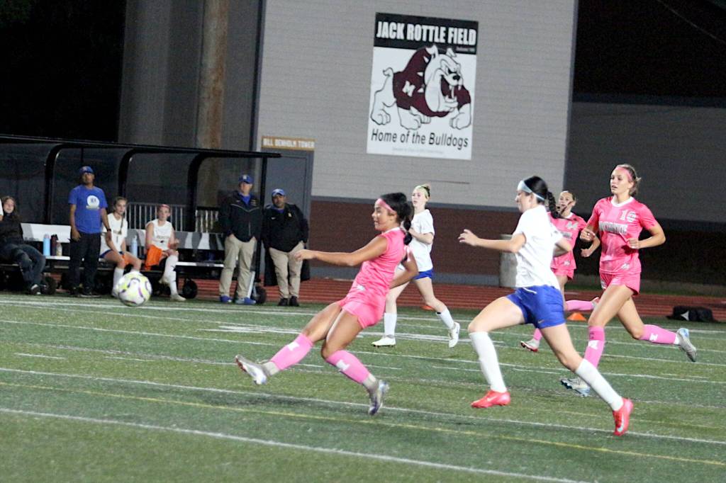 RYAN SPARKS | THE DAILY WORLD Montesano forward Jaelyn Butterfield (left) scores one of her two goals during an 8-0 victory over Rochester on Thursday at Montesano High School.