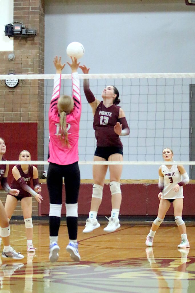 RYAN SPARKS | THE DAILY WORLD Montesano middle blocker Carmen Bennefeld (13) makes a play at the net during a 3-0 win over Rochester on Thursday at Montesano High School.