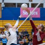 PHOTO BY FOREST WORGUM Aberdeen middle blocker Dallyn Williams (3) jousts with W.F. Wests Vivy Witchey during the Bobcats 3-0 win on Thursday in Aberdeen.