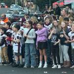 Montesano youth gather downtown to root on the football team and cheerleaders at the 2025 Montesano Homecoming Parade.
