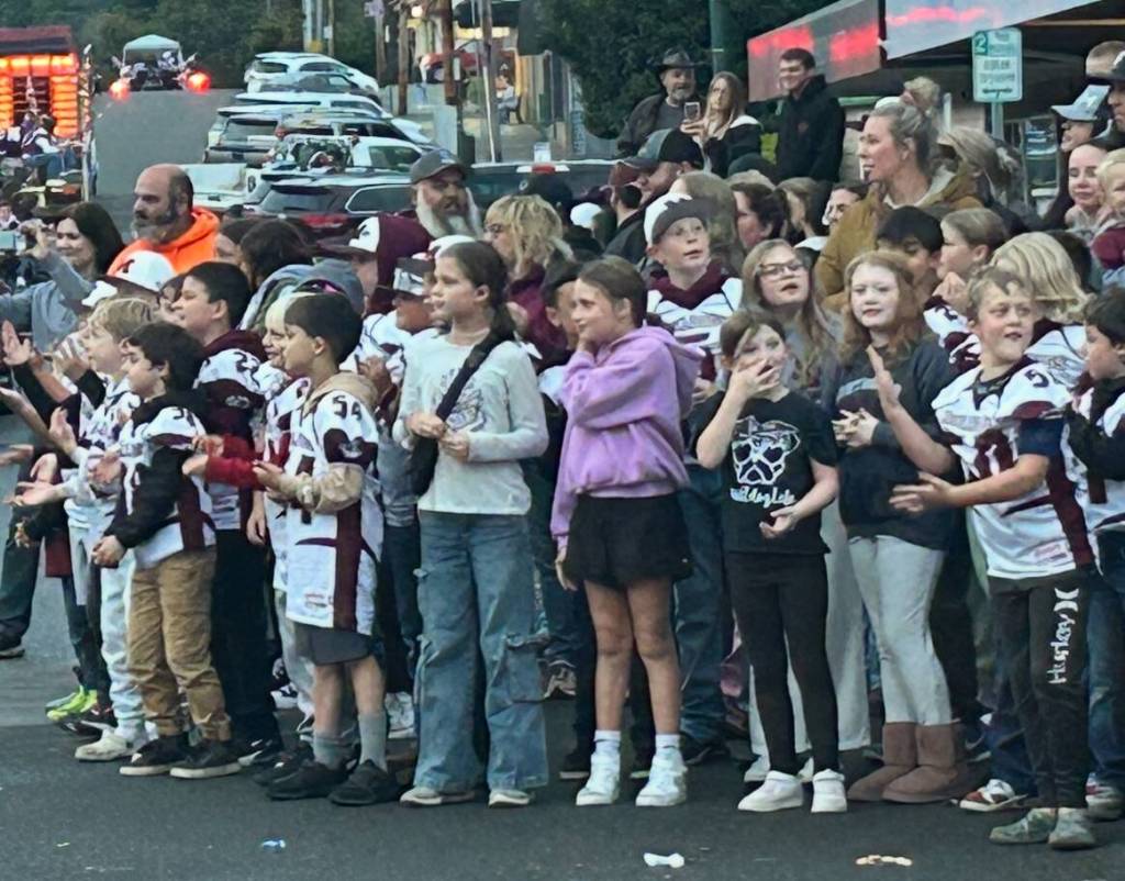 Montesano youth gather downtown to root on the football team and cheerleaders at the 2025 Montesano Homecoming Parade.