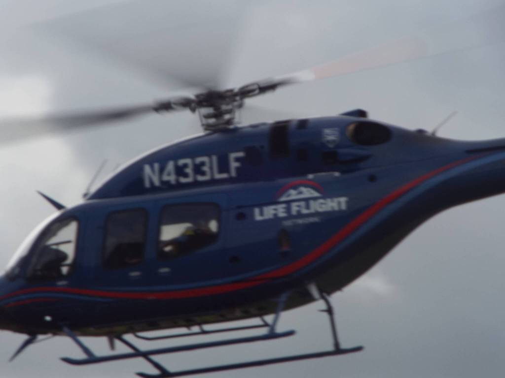 Attendees of the hangar celebration had the opportunity to see Life Flights crew in action, because the Hoquiam Fire Department had a patient who needed to be medevacd. (Andrea Watts / The Daily World)