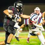 PHOTO BY MATT RUMBLES
Raymond-South Bends Chris Banker (left) collides with Pe Ell-Willapa Valleys Blane King during a game on Oct. 3. The Ravens face Napavine on Friday.