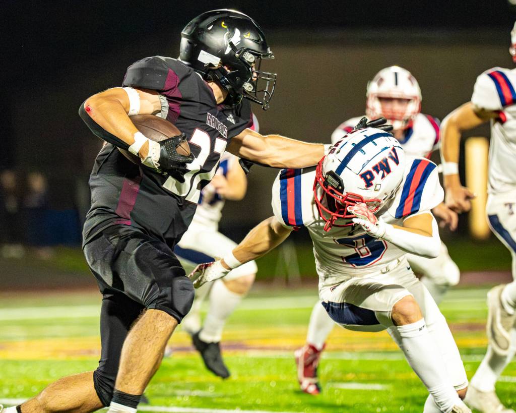 PHOTO BY MATT RUMBLES
Raymond-South Bends Chris Banker (left) collides with Pe Ell-Willapa Valleys Blane King during a game on Oct. 3. The Ravens face Napavine on Friday.